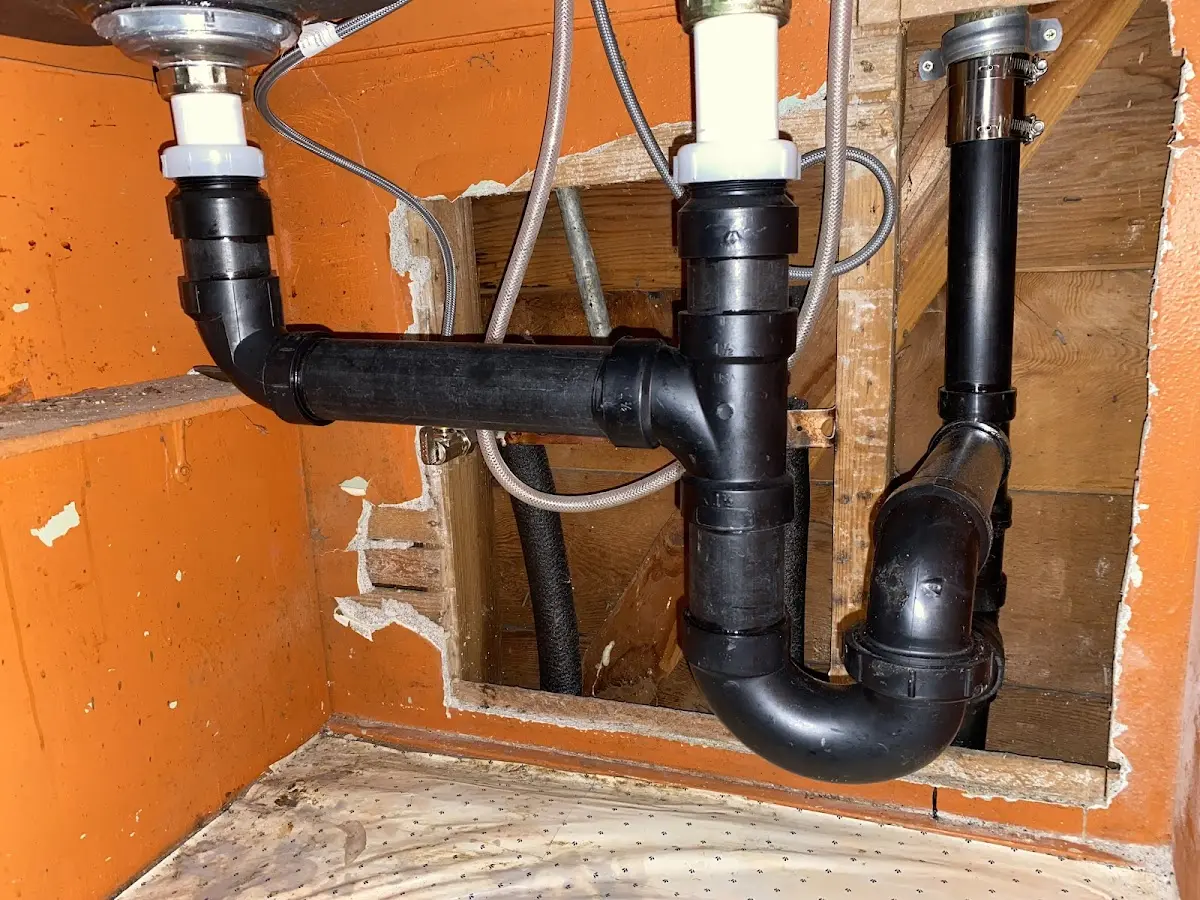 Professional Garbage Disposal Repair equipment and tools on the job in Westminster